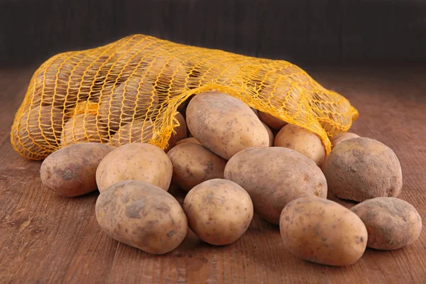 Aardappel in zak — Stockfoto