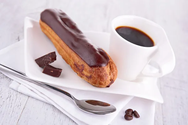 Coffee cup and pastry — Stock Photo, Image