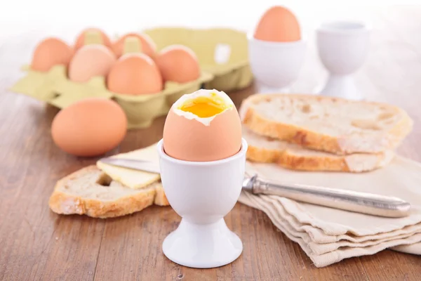 Boiled egg and bread — Stock Photo, Image