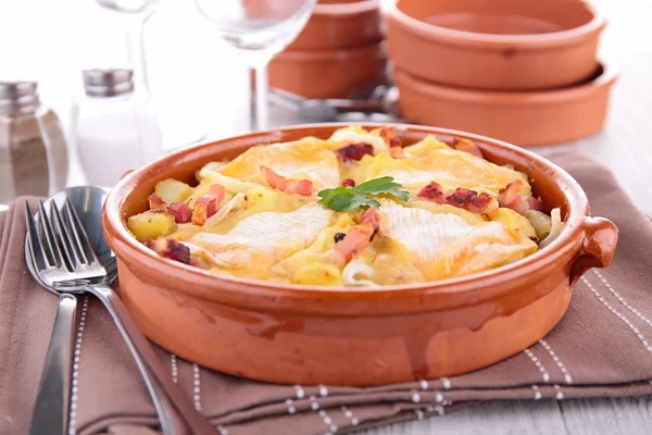 Baked potato with cheese and bacon, tartiflette — Stock Photo, Image