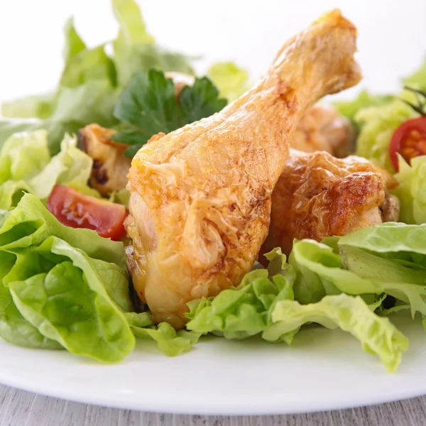 Chicken leg and salad — Stock Photo, Image
