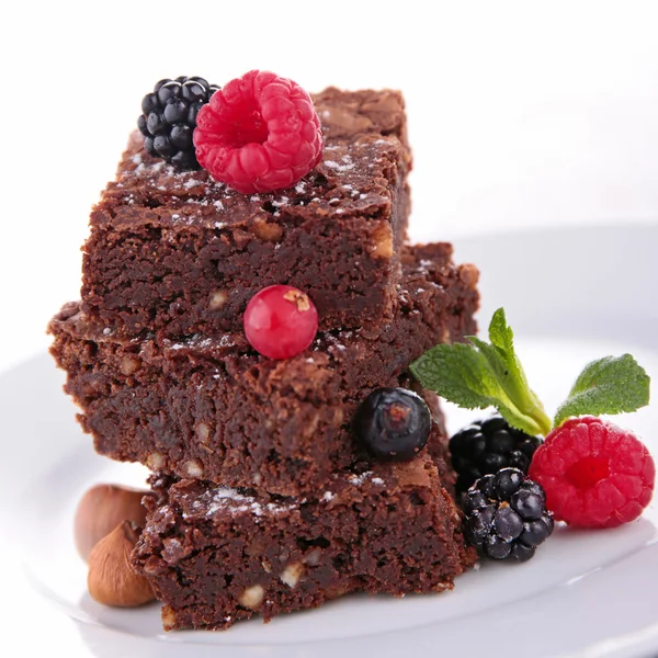 Stack of brownies and berries — Stock Photo, Image