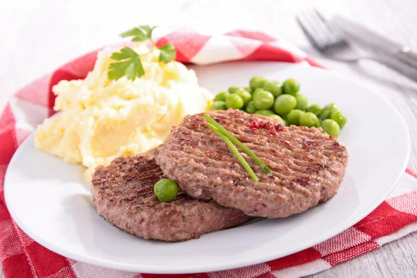Beefsteak, mashed potatoes and pea — Stock Photo, Image