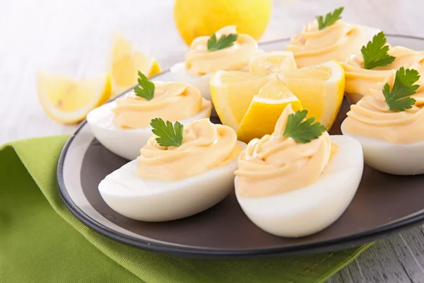 Egg filled with mayonnaise — Stock Photo, Image