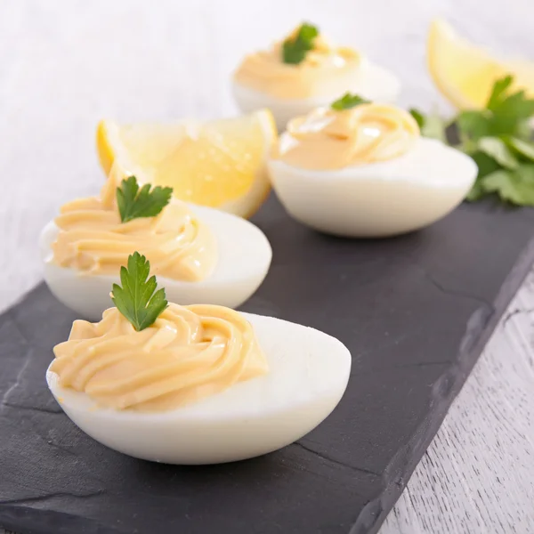 Egg filled with mayonnaise — Stock Photo, Image