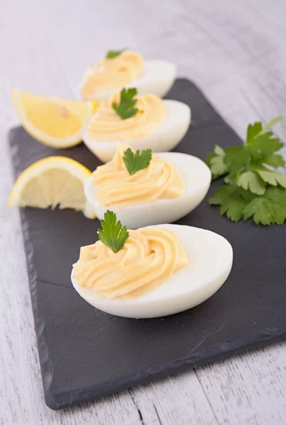 Egg filled with mayonnaise — Stock Photo, Image