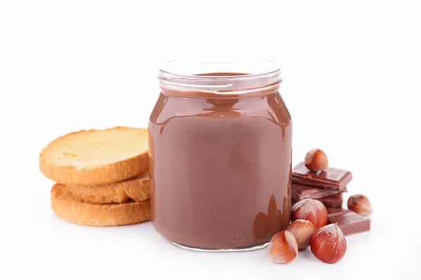 Chocolate spread and nuts — Stock Photo, Image