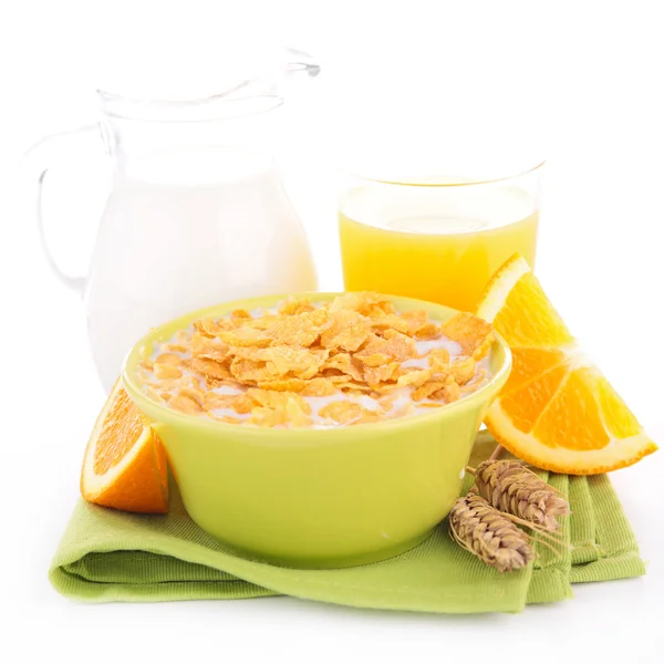 Cornflakes, orange juice and milk — Stock fotografie