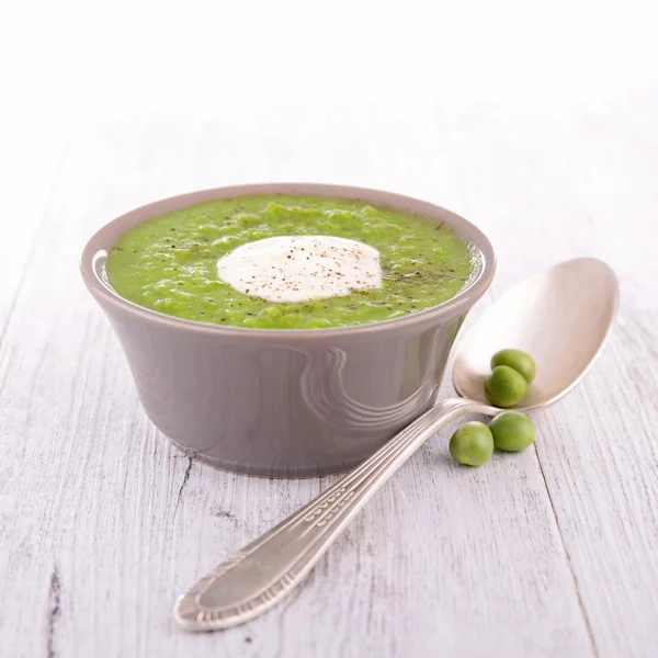 Pea soup and cream — Stock Photo, Image