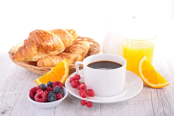 Croissant and coffee cup — Stock Photo, Image