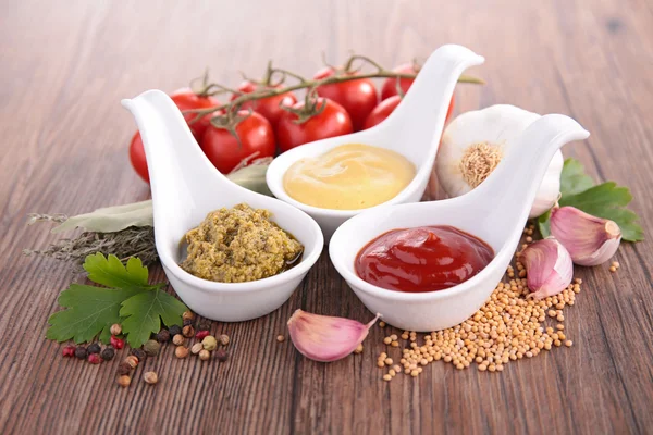 Mustard,ketchup and pesto sauce — Stock Photo, Image