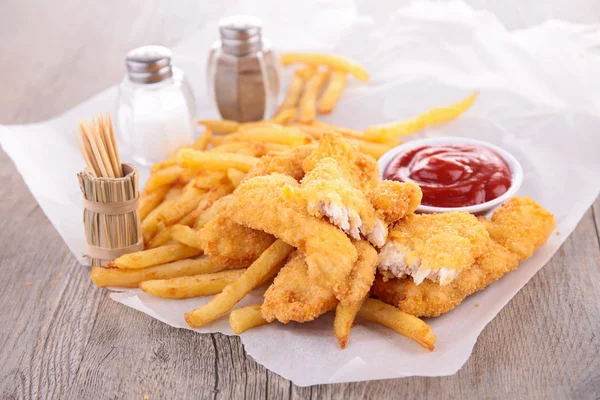 French fries and fried nuggets — Stock Photo, Image