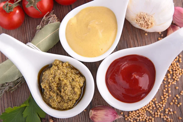 Mustard, ketchup and pesto — Stock Photo, Image