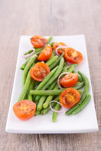 Zelené fazole a rajčat — Stock fotografie