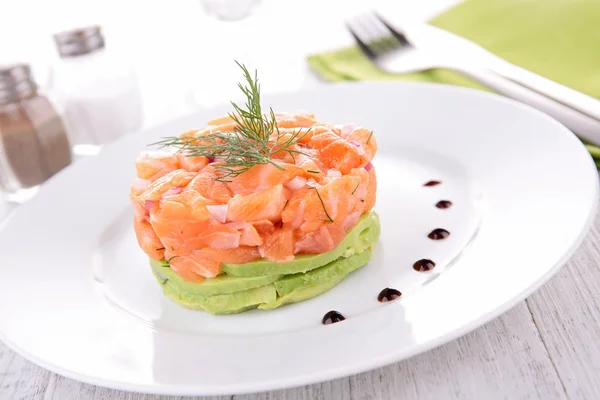 Salmon tartar and avocado — Stock Photo, Image