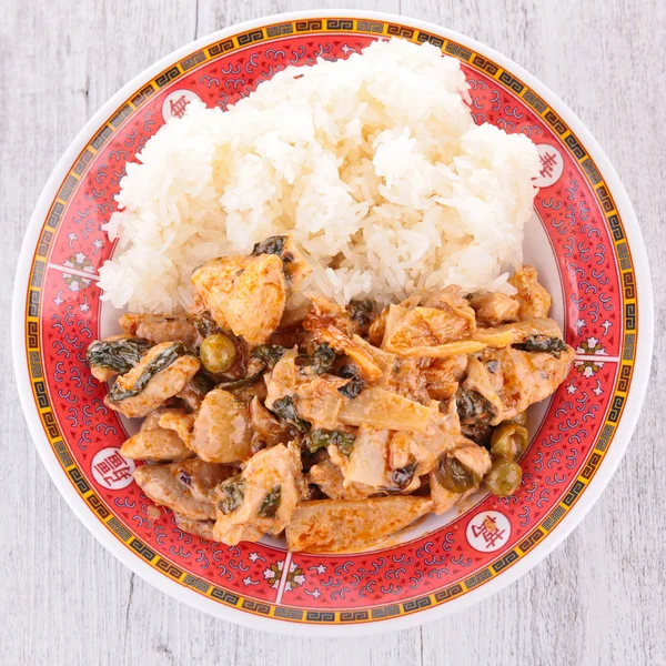 Asian cuisine with rice and chicken — Stock Photo, Image