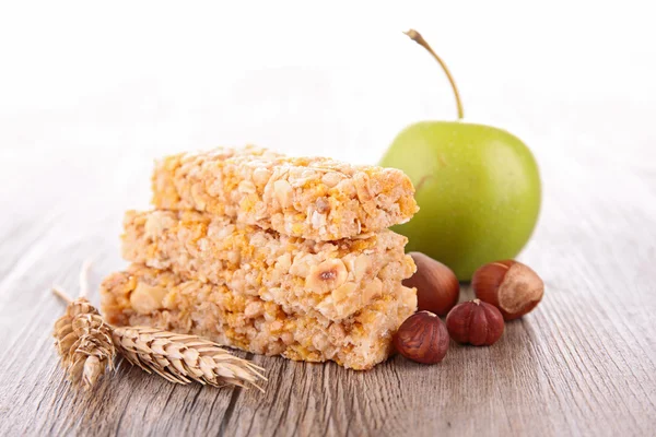 Granola with nuts and apple — Stock Photo, Image