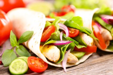 close up on gourmet fajita with chicken and vegetable