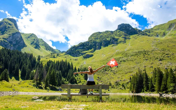 Traveler Woman Swiss Flag Countryside Lake Mountain — Stockfoto