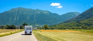 motorhome on the road- travel,  vacation, trip concept