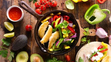 grilled chicken,  bell pepper and avocado with tortilla bread wrap