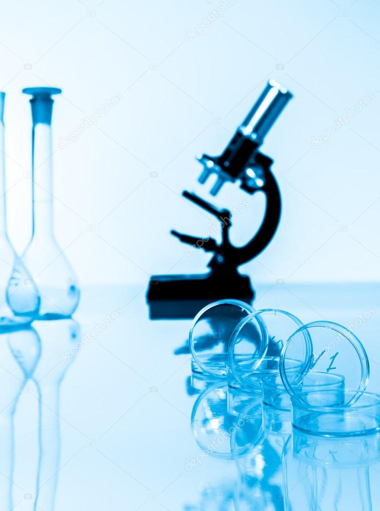 microscope and test tubes used in laboratory