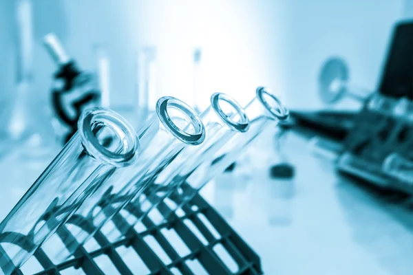 Test tubes closeup on blue background..medical glassware — Stock Photo, Image