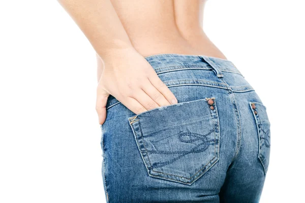 Fit female butt in blue jeans, isolated on white — Stock Photo, Image
