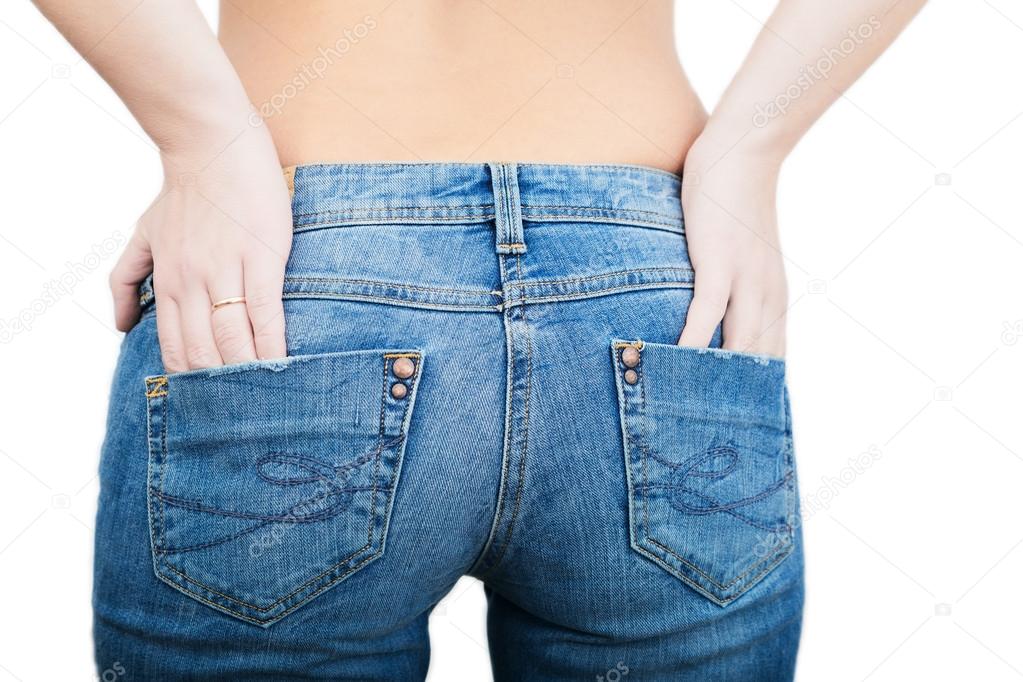 Fit female butt in blue jeans, isolated on white