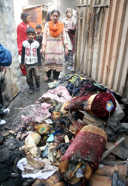 Christian family of Joseph Colony seen their demolish house by an angry mob during protest against blasphemy committed by a Christian man Sawan Masih — Stock Photo, Image