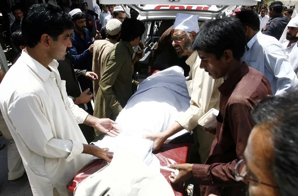 Shift dead body of female polio health worker to Ambulance from a local hospital, who gunned down by unidentified gunmen — Stock Photo, Image