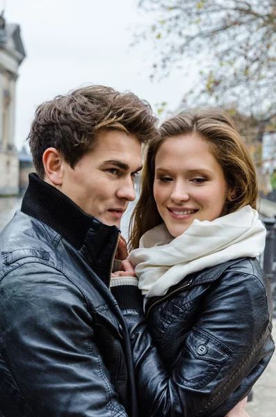 Couple In Winter Jackets Embracing — Stock Photo, Image