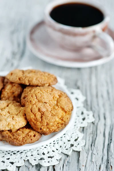 Biscoitos e xícara de café — Fotografia de Stock