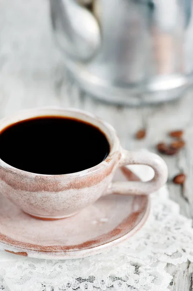 Tazza di caffè e chicchi di caffè — Foto Stock