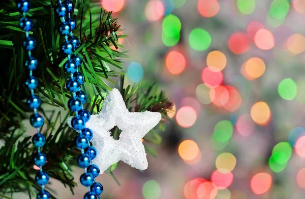 輝きの背景にクリスマスの星の図形 — ストック写真