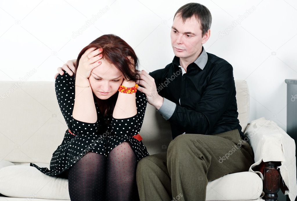 Man comforting his woman