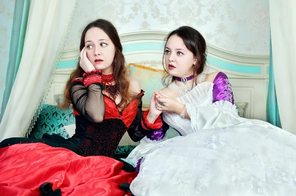 Two women sisters in medieval dresses — Stock Photo, Image