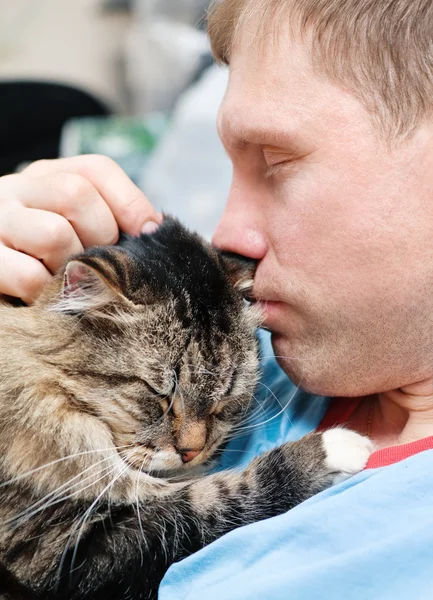 Man with cat — Stock Photo, Image