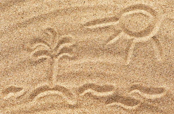 Drawing sun, waves and island on the sand — Stock Photo, Image