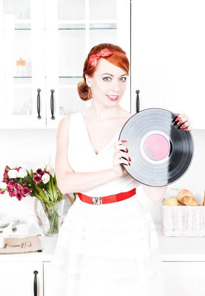 Beautiful woman with vinyl record — Stock Photo, Image