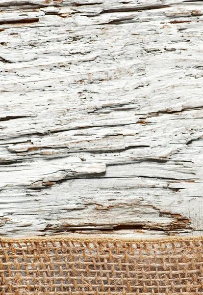 リボンの解任と古い木製の背景 — ストック写真