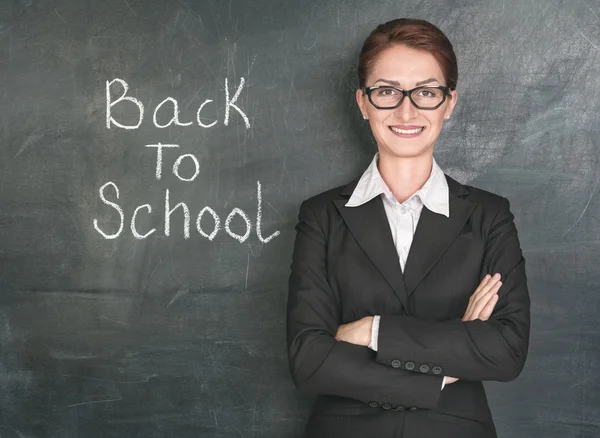 Back to school with happy teacher — Stock Photo, Image