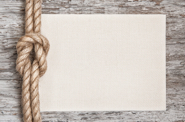 Ship rope, shells and wood background