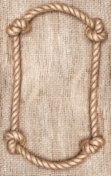 Rope frame and burlap background — Stock Photo, Image