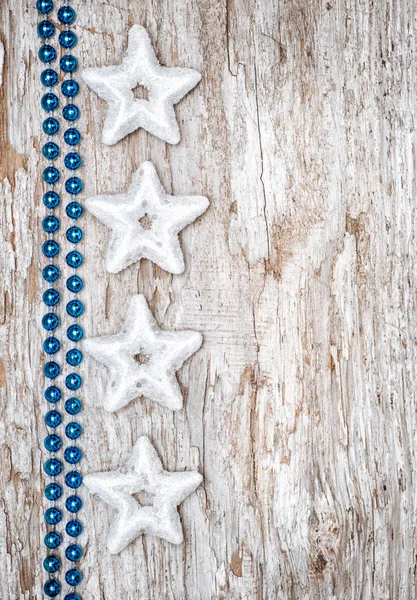 Jul bakgrund med stjärna former och halsband — Stockfoto