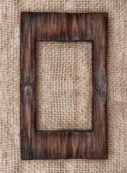 Leeftijd houten frame op de jute — Stockfoto