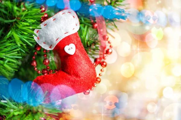 Christmas red sock on fir tree — Stock Photo, Image