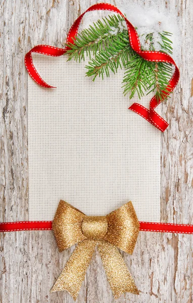 Cartão de Natal com ramo de fita, laço e abeto vermelho — Zdjęcie stockowe