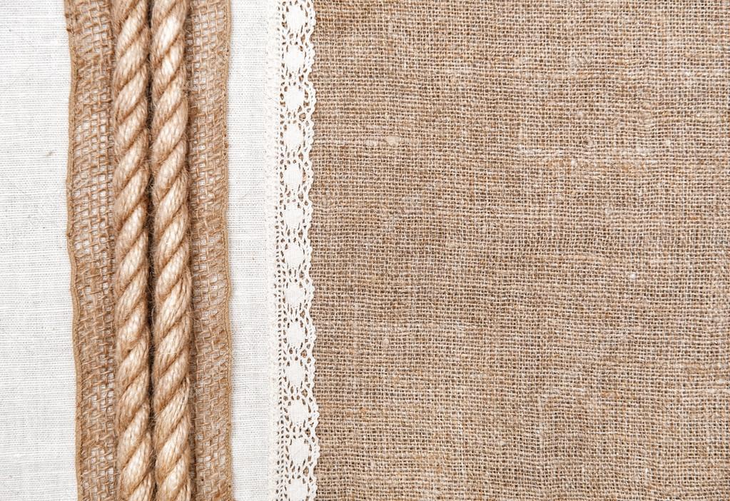 Burlap background with linen cloth and rope