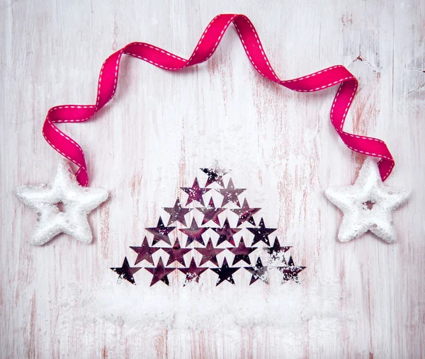 Decoración navideña con estrellas en madera vieja — Foto de Stock